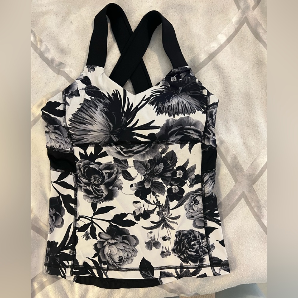 Lulu lemon black and white floral design sleeveless athletic top.